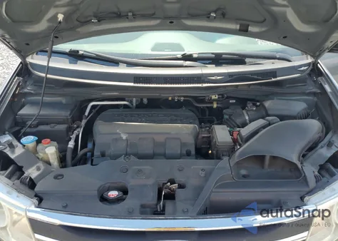 2012 Honda Odyssey Touring z USA, uszkodzony, nr VIN 5FNRL5H92CB014437